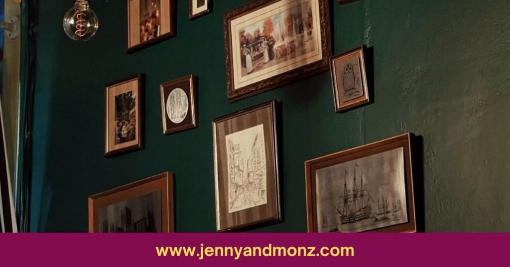 Photo wall frames on wall with an assymetrical layout