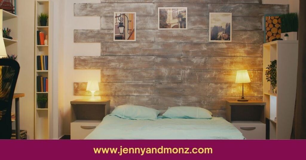 exposed brick wall decor with posters hanging above bed
