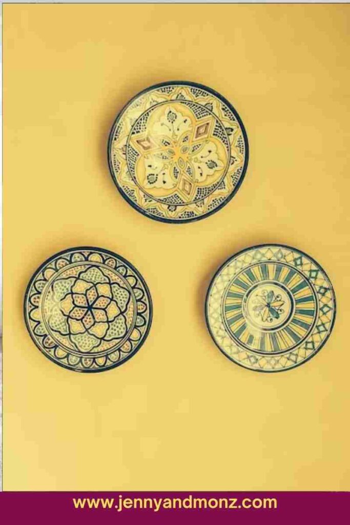 Plates on a yellow colored big wall