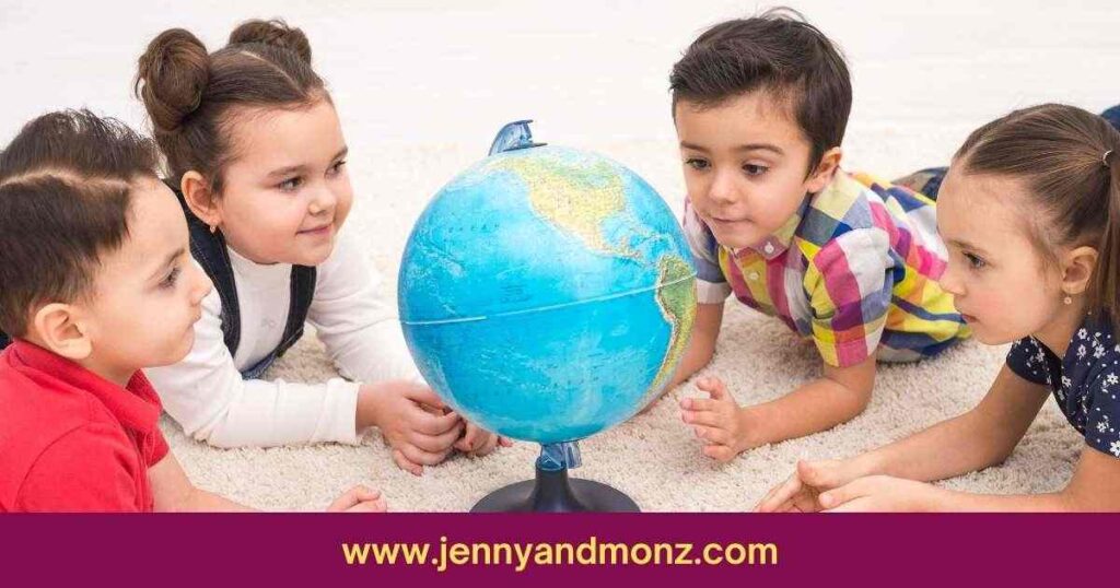 children playing with globe map