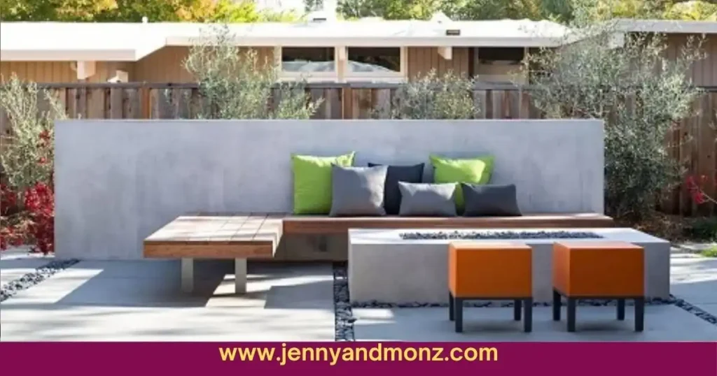 Patio wall decorated with wooden bench and pillows